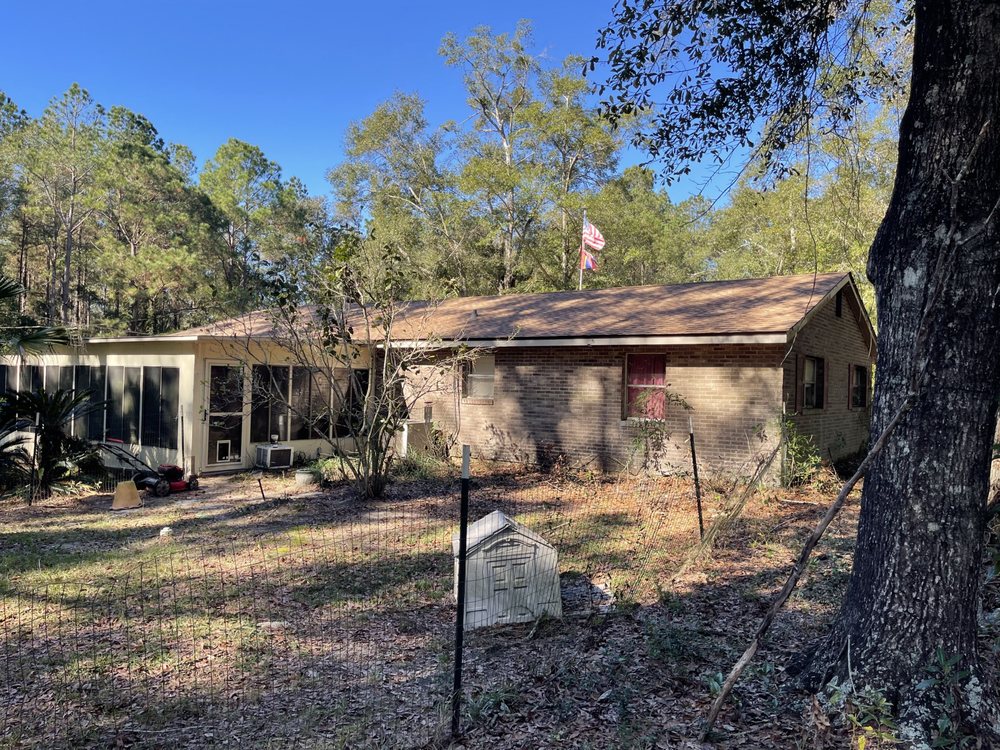 Slide of SJ&H Roofing