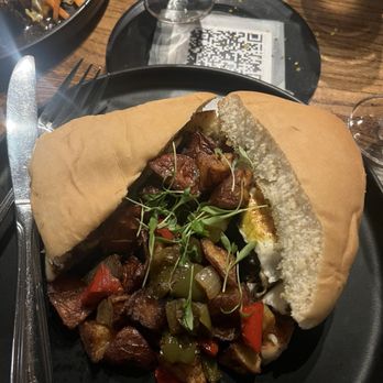 APT 4B - Oxtail and coco bread sandwich - Lounges Near Me - Atlanta, Georgia