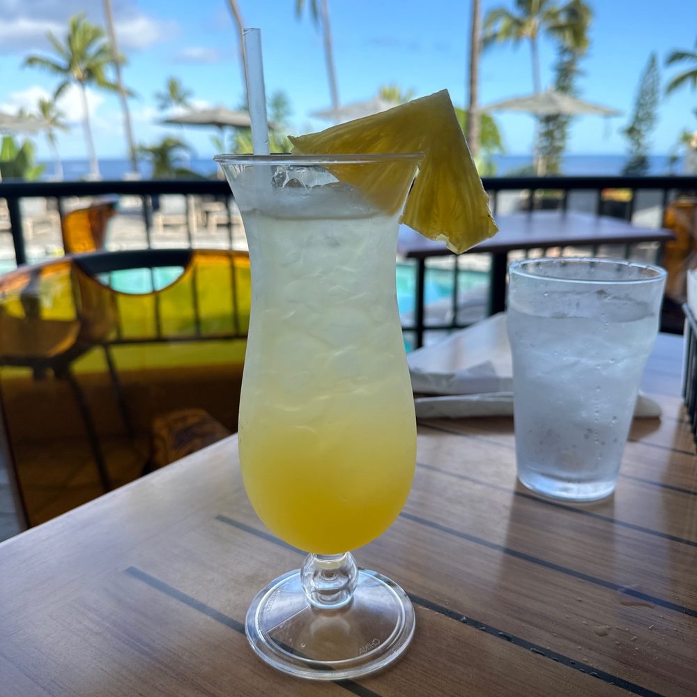 Sunset Terrace - Lilikoi spritzer - Bars Near Me - Kailua-Kona, Hawaii Sunset Terrace - Lilikoi spritzer - Bars Near Me - Kailua-Kona, Hawaii