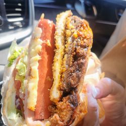 Maiz y Que - This torta is  beans, chorizo, beef/chicken milanesa, sausage, ham and all the fixings! Yum!