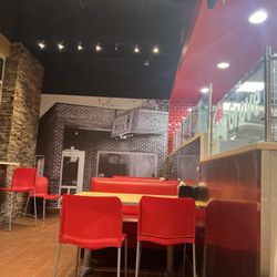Domino's Pizza - Seating area is quite large ( I'm sitting on a side bench)