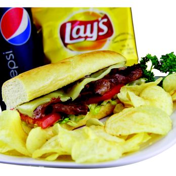 Husson's Pizza - a plate of chips and a sandwich - Pizza Near Me - Saint Albans, West Virginia Husson's Pizza - a plate of chips and a sandwich - Pizza Near Me - Saint Albans, West Virginia