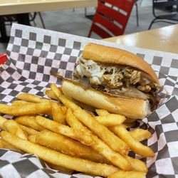 Philly Steak & Burger - Chicken philly with fries.