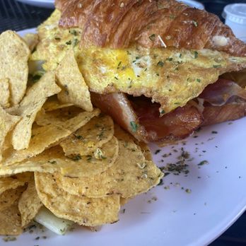 Coffee at the View - Croissant omelet and chips. I hear the cinnamon roll is the best thing to get here. - Breakfast & Brunch Near Me - Río Grande, Puerto Rico Coffee at the View - Croissant omelet and chips. I hear the cinnamon roll is the best thing to get here. - Breakfast & Brunch Near Me - Río Grande, Puerto Rico