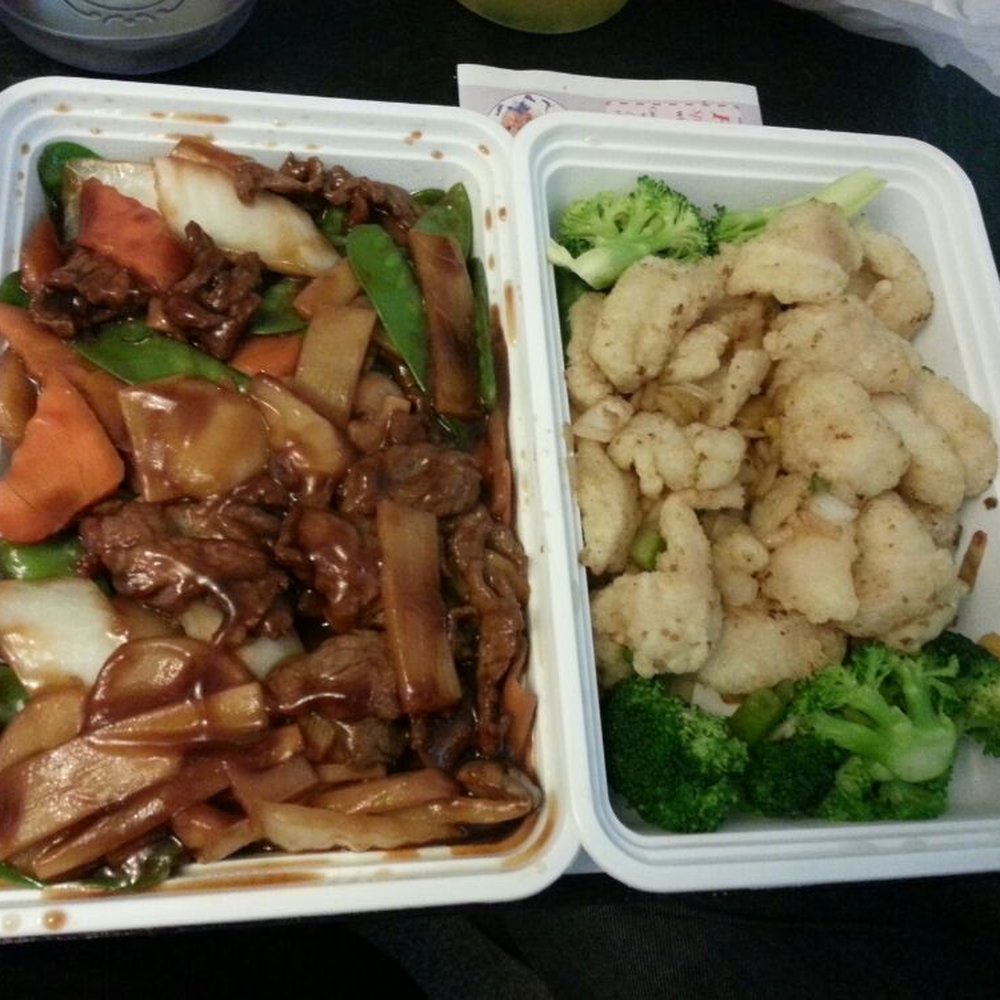 Left: beef in oyster sauce, right: salt and pepper fish filets. Left: beef in oyster sauce, right: salt and pepper fish filets.