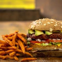 MOOYAH Veggie Burger with fresh avocado and Sweet Potato Fries.
