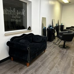 Shear Perfection Salon & Spa - Sit and relax on the beautiful black velvet sofa in our waiting area , self care is extremely important.