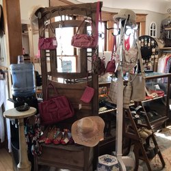 The Resale Boutique - Large selection of name brand purses and shoes.