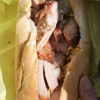 Sugarmama Sugarcane - Grilled chicken sandwich (I stole a piece already.) - Juice Bars & Smoothies Near Me - Hayward, California