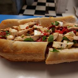 Antonio'S D Pizza - La Bella vita sub - grilled chicken, fresh mozzarella, roasted peppers, sun fried tomatoes, Arugula