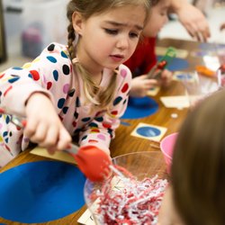 Parents' Cooperative Preschool & Kindergarten - Having fun at the sensory stations at this year's Valentine's Day party