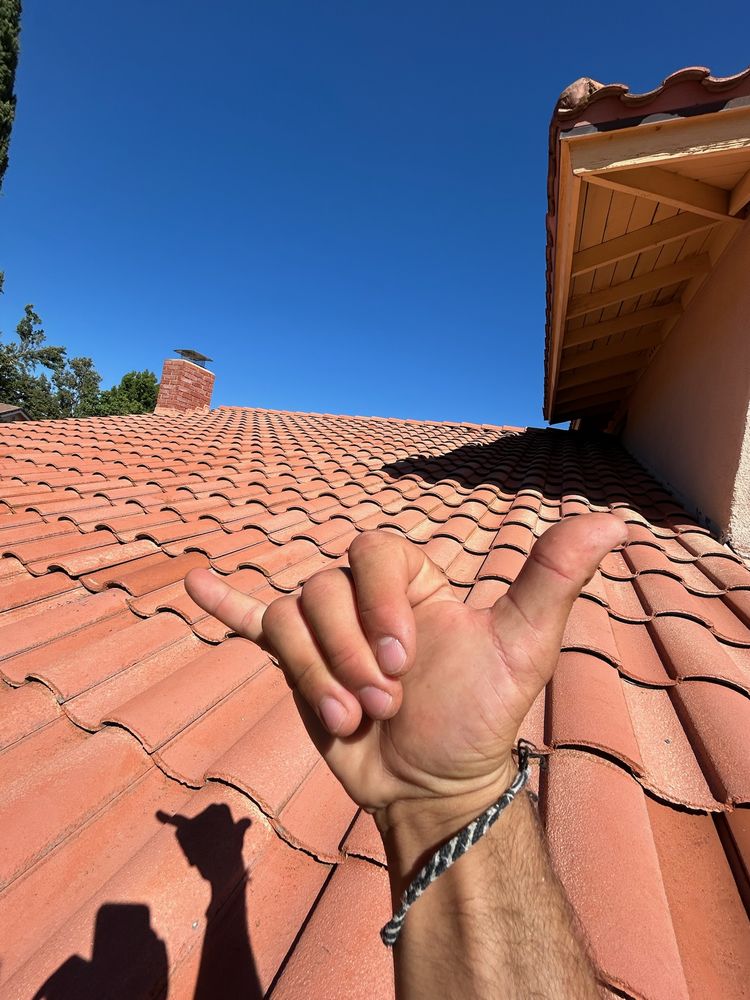 Slide of Aloha Bros Roof Cleaning