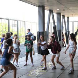 BASIS Independent Brooklyn - Middle school students playing volleyball at recess.