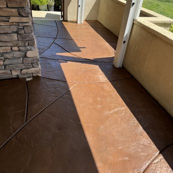 Supreme Steam & Pressure Cleaning - It is the ladies patio that we stained a brownish, red color and put a commercial grade sealant on it - Pressure Washers Near Me Supreme Steam & Pressure Cleaning - It is the ladies patio that we stained a brownish, red color and put a commercial grade sealant on it - Pressure Washers Near Me