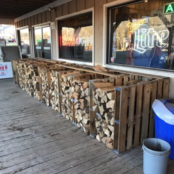 Beer Nuts - stacked firewood in front of a store - Tobacco Shops Near Me - Effort, Pennsylvania