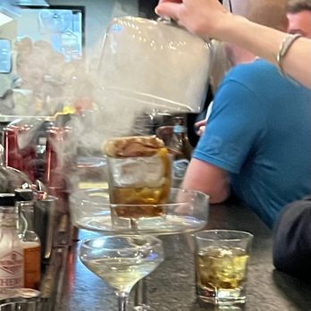 Brick & Bourbon - Smoked Bourbon drink uncovered after 30 seconds - New American Near Me - Stillwater, Minnesota Brick & Bourbon - Smoked Bourbon drink uncovered after 30 seconds - New American Near Me - Stillwater, Minnesota