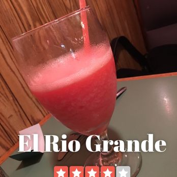 El Rio Grande - a glass of juice with a straw - Mexican Near Me - Stoughton, Wisconsin