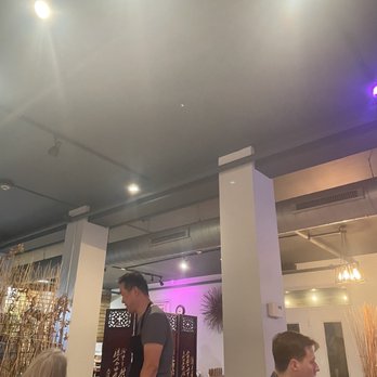 Hikari Sushi - Inside with friendly owner asking people how their food was - Japanese Near Me - Philadelphia, Pennsylvania