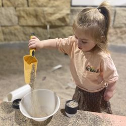 Children's Museum of Southern Minnesota - Playing in the Mankato Quarry sand section.