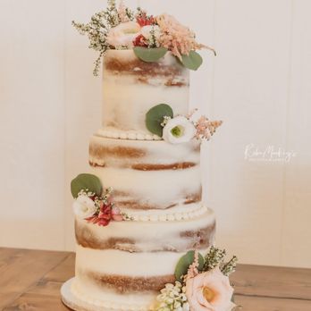 Sugarica - a three tiered wedding cake with fresh flowers - Desserts Near Me - Bartlesville, Oklahoma Sugarica - a three tiered wedding cake with fresh flowers - Desserts Near Me - Bartlesville, Oklahoma