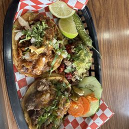 Carne asada and al pastor tacos Carne asada and al pastor tacos