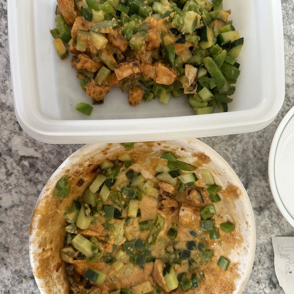 Pita Pit - What was supposed to be a Southwest Chicken rice bowl... instead is a soup sauce full of cucumber & chicken. - Sandwiches Near Me - Peterborough, Ontario