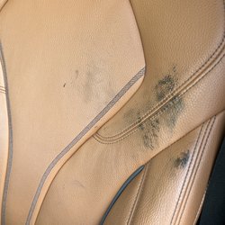 Passport BMW - Oil left on my leather seats after service