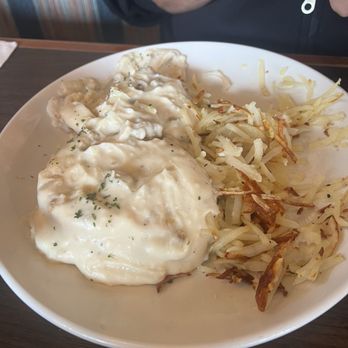 Broken Yolk Cafe - Biscuits and gravy. Note this is a herb gravy and not a sausage one. - Breakfast & Brunch Near Me - El Cajon, California