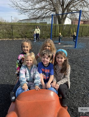Play Yard - Children learn through play, not just motor skills, but interpersonal skills they will use for a lifetime. Our secure play yard gives them fresh air, and green space all year round. Play Yard - Children learn through play, not just motor skills, but interpersonal skills they will use for a lifetime. Our secure play yard gives them fresh air, and green space all year round.