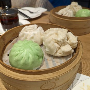 Jingle Bao - Steamed bun combo (green=pandan chicken shrimp, and the other two one is chicken and other is BBQ pork) - Asian Fusion Near Me - Vancouver, British Columbia Jingle Bao - Steamed bun combo (green=pandan chicken shrimp, and the other two one is chicken and other is BBQ pork) - Asian Fusion Near Me - Vancouver, British Columbia
