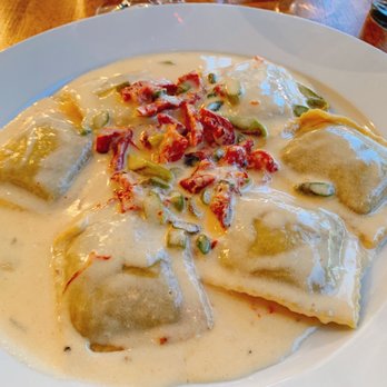 Certo Italian Restaurant - Ravioli stuffed with short ribs meat, creamy sauce and sun-dried tomatoes - Italian Near Me - Miami, Florida Certo Italian Restaurant - Ravioli stuffed with short ribs meat, creamy sauce and sun-dried tomatoes - Italian Near Me - Miami, Florida