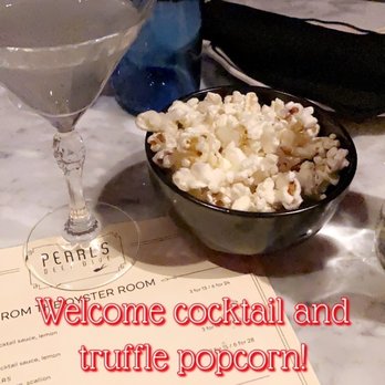 Pearl's Deep Dive - Truffle popcorn and welcome cocktail-lavender gin - Cocktail Bars Near Me - Royal Oak, Michigan