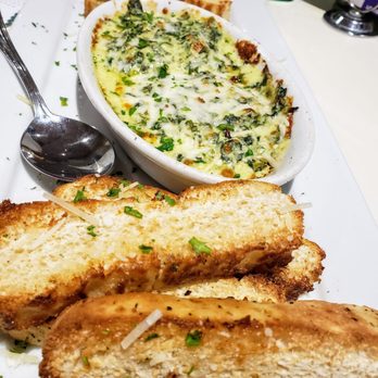 Reginelli's Pizzeria - Spinach and Artichoke Dip - Pizza Near Me - Metairie, Louisiana Reginelli's Pizzeria - Spinach and Artichoke Dip - Pizza Near Me - Metairie, Louisiana