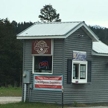 Little Spoon Espresso - a small building on a dirt road - Coffee & Tea Near Me - Bigfork, Montana