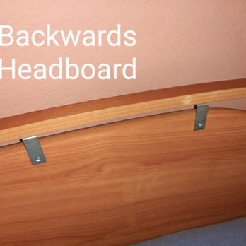 A2B Movers - This shows headboard put on backwards. You can see visible screws and brackets are facing bed area instead of wall. - Movers Near Me - San Jose, California A2B Movers - This shows headboard put on backwards. You can see visible screws and brackets are facing bed area instead of wall. - Movers Near Me - San Jose, California