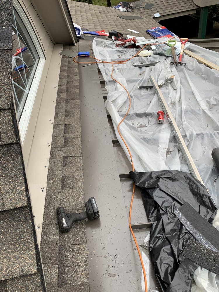 Slide of Grand Prize Roofing