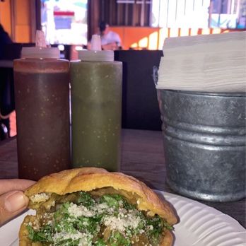 Cocina Dona Chona - Gordita de chicarrón en salsa verde - Mexican Near Me - Los Angeles, California Cocina Dona Chona - Gordita de chicarrón en salsa verde - Mexican Near Me - Los Angeles, California