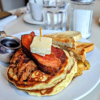 The Red Wagon - a stack of pancakes with butter and strawberries - Diners Near Me - Vancouver, British Columbia The Red Wagon - a stack of pancakes with butter and strawberries - Diners Near Me - Vancouver, British Columbia