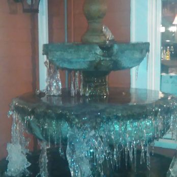 Girardi's Osteria - The outside fountain frozen in ice - Italian Near Me - Edmonds, Washington Girardi's Osteria - The outside fountain frozen in ice - Italian Near Me - Edmonds, Washington