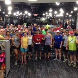 In Flight members pack the newly remodeled Fleet Feet Rice store before a Saturday store long run.
