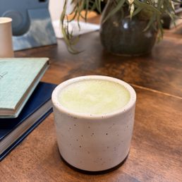 Hot matcha latte with almond milk