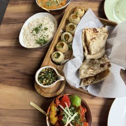Paneer Korma, Gal Goppe, Plain Naan, Half Chilli Chicken Paneer Korma, Gal Goppe, Plain Naan, Half Chilli Chicken