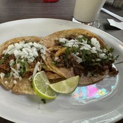 Al pastor and steak tacos (Mexican style with corn tortillas)