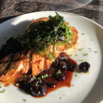 Skates On The Bay - Salmon over risotto cakes and a sweet sauce, topped with kale - Seafood Near Me - Berkeley, California