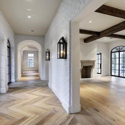 Christopher Zoltan Designs - New floors and ceiling beams. Updated the interior paint and lighting. They did. A great job!