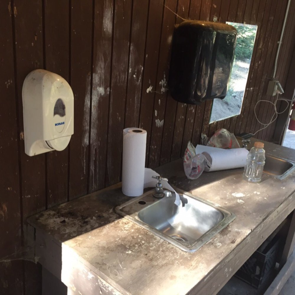 Camp Kern - The sinks next to the showers. You can't see how dirty it is with dead bugs everywhere. - Summer Camps Near Me - Lakeshore, California