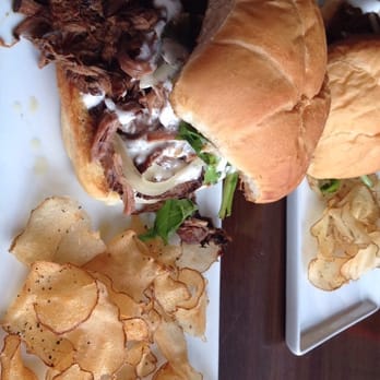 Estelles Eatery & Bar - To die for pot roast sandwich with grilled onions, arugula, creamy horseradish sauce, and a perfect bun to soak up the running juice. - New American Near Me - Harmony, Minnesota Estelles Eatery & Bar - To die for pot roast sandwich with grilled onions, arugula, creamy horseradish sauce, and a perfect bun to soak up the running juice. - New American Near Me - Harmony, Minnesota