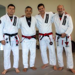 Jean Jacques Machado Brazilian Jiu-Jitsu Academy - Professors Jay Zeballos and Mark Armstrong along with Masters Jean Jacques Machado and Rickson Gracie.