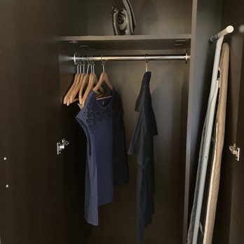 Sleep Inn & Suites Roseburg North Near Medical Center - Armoire with hangers and ironing board - Hotels Near Me - Roseburg, Oregon Sleep Inn & Suites Roseburg North Near Medical Center - Armoire with hangers and ironing board - Hotels Near Me - Roseburg, Oregon