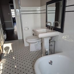 Tub and tile refinished. Tub and tile refinished.
